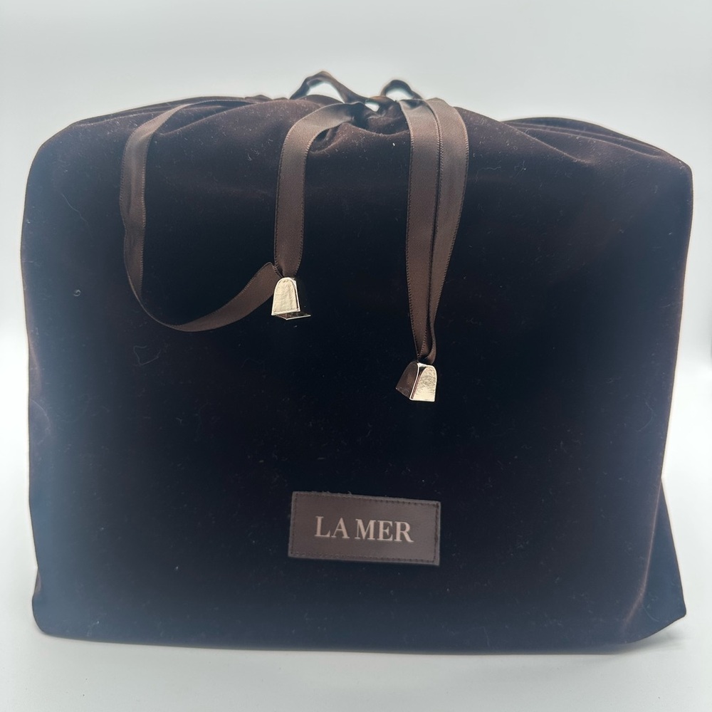 La Mer silver vanity with Velvet lining mirror and dust bag